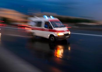 Ambulance car speeding, blurred motion