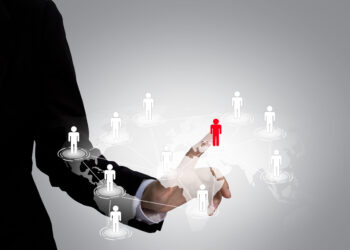 Social Network concept : hand point to social network and world map