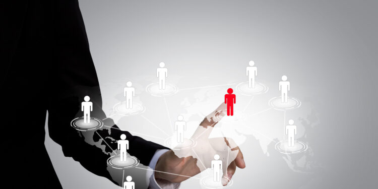 Social Network concept : hand point to social network and world map